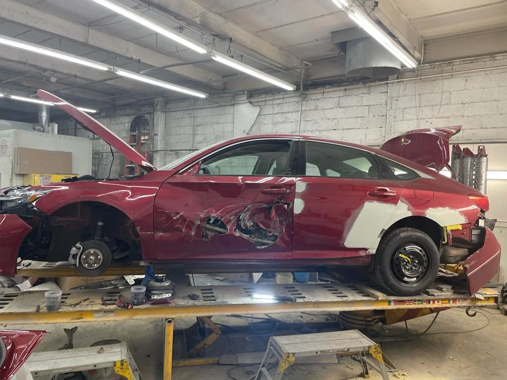 Marty's Auto Body - oil Change Services in New York NY